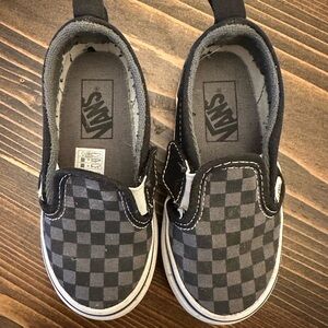 Vans Black and Gray Slip-On Sneakers with Checkerboard Pattern